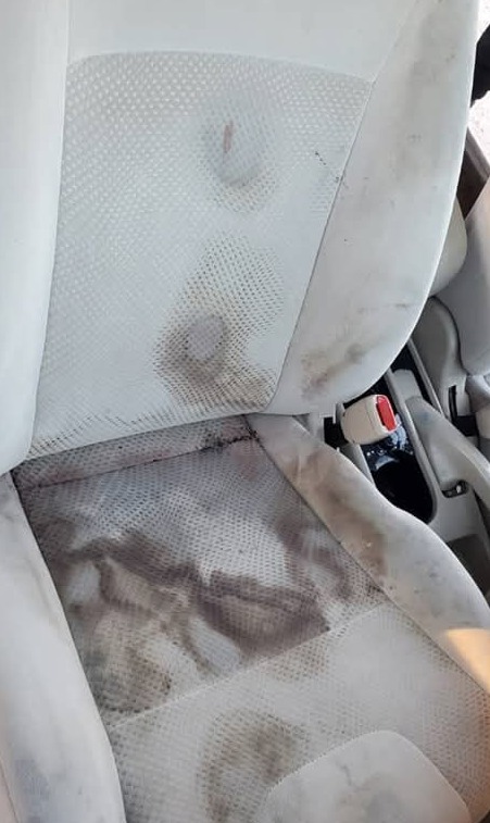 Vehicle cloth seat stained with heavy water tide marks